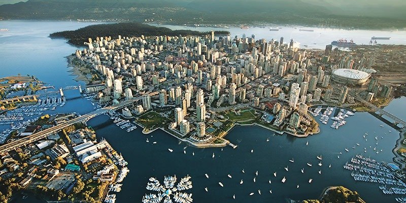Beautiful skyline of Vancouver with expert roofing solutions by XD Roofing, specializing in roofing Vancouver and roof repair Vancouver.